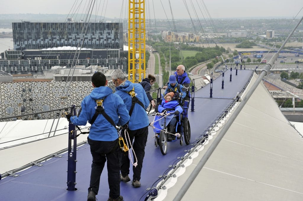 This is a picture of Attitude is Everything Founder Suzanne Bull MBE traversing The O2.